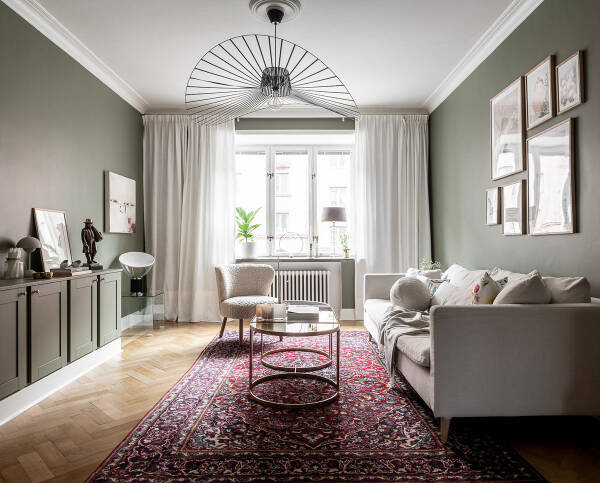 Стильные оттенки зелёного и серого в интерьерах шведской квартиры (88 кв. м)