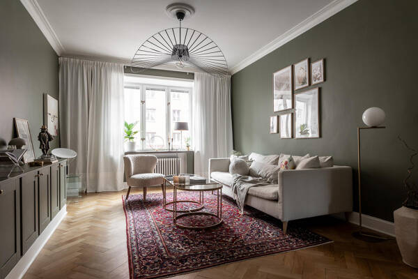 Стильные оттенки зелёного и серого в интерьерах шведской квартиры (88 кв. м)