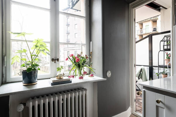 Стильные оттенки зелёного и серого в интерьерах шведской квартиры (88 кв. м)