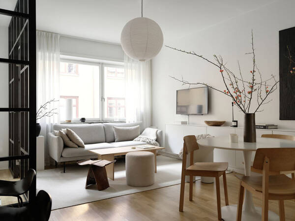 Мягкий минимализм и стеклянная перегородка: маленькая квартира в Стокгольме (39 кв. м)